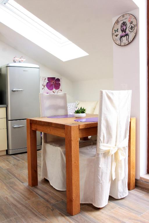 Kuchyň nebo kuchyňský kout v ubytování Apartment LuVi