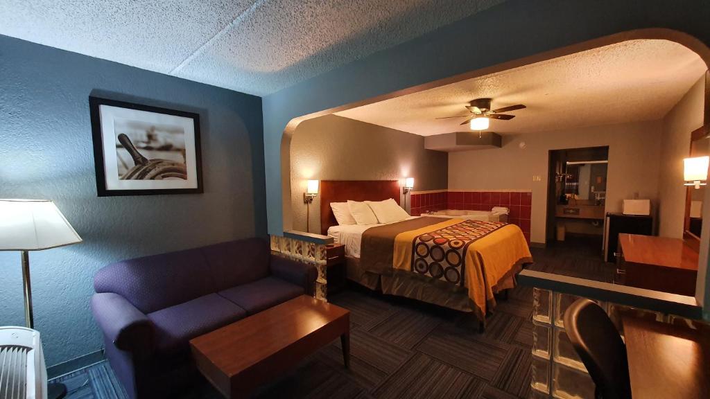 Postel nebo postele na pokoji v ubytování South Padre Island Inn