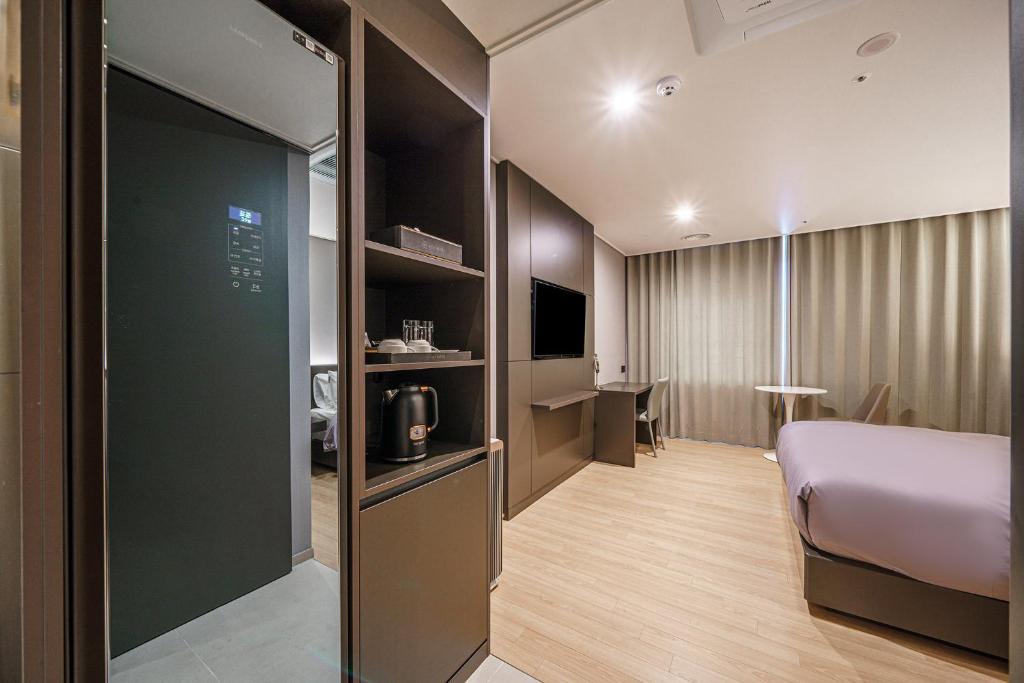 Kuchyň nebo kuchyňský kout v ubytování Act Hotel