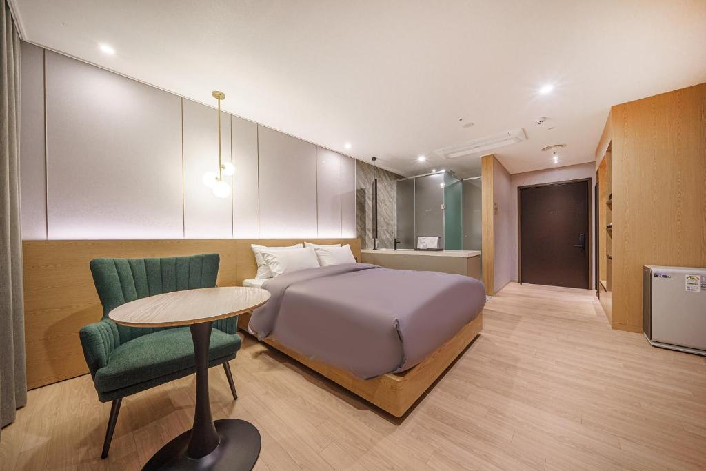 Postel nebo postele na pokoji v ubytování Act Hotel