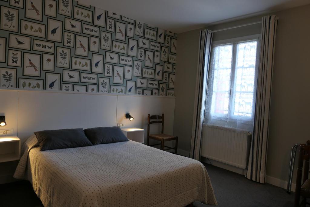 Postel nebo postele na pokoji v ubytování Hotel Kapa Gorry