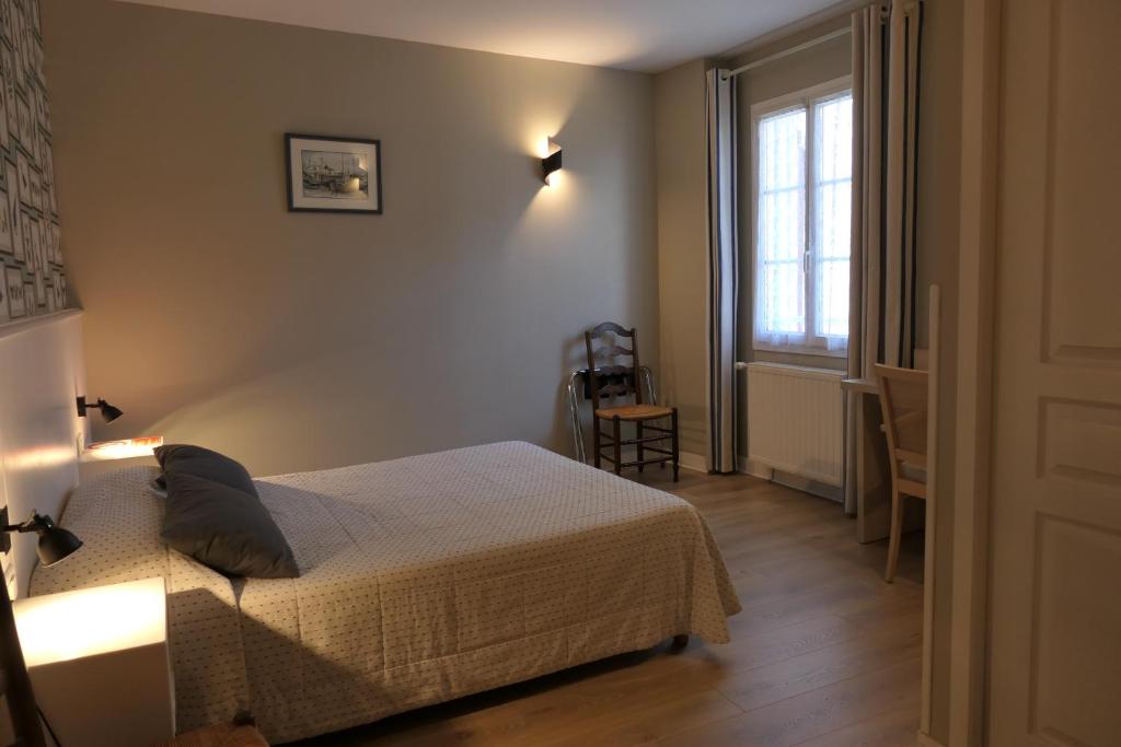 Postel nebo postele na pokoji v ubytování Hotel Kapa Gorry
