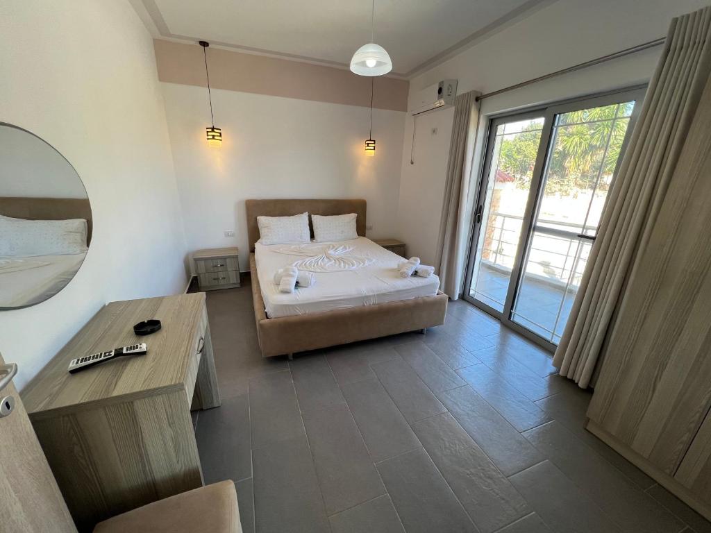 Postel nebo postele na pokoji v ubytování Hotel Irini