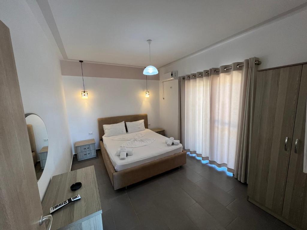 Postel nebo postele na pokoji v ubytování Hotel Irini