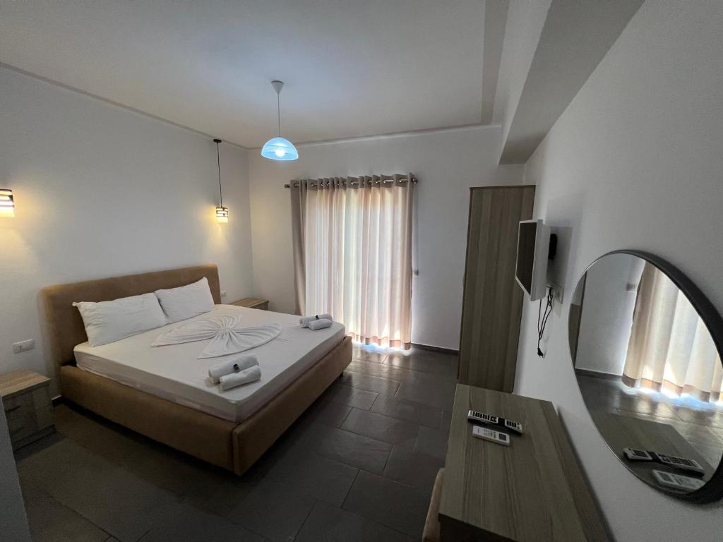 Postel nebo postele na pokoji v ubytování Hotel Irini
