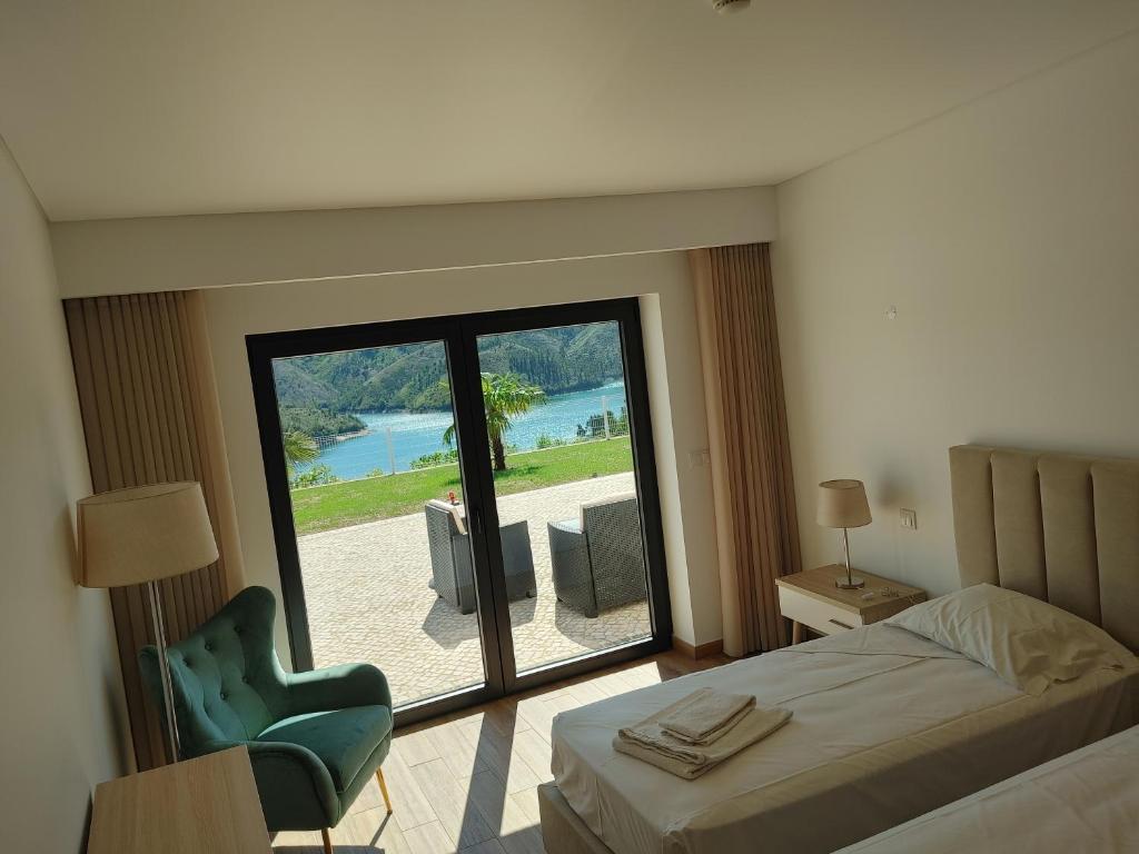 Postel nebo postele na pokoji v ubytování Lago Azul Villas