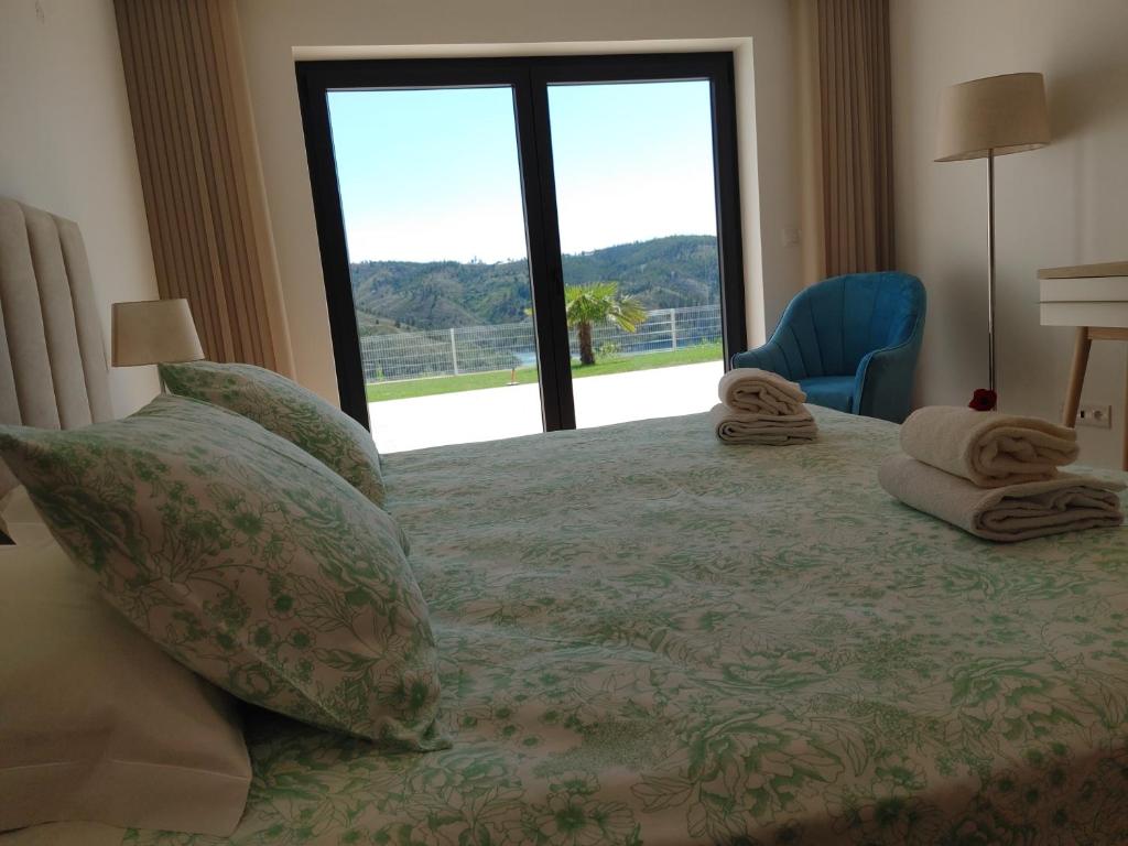 Postel nebo postele na pokoji v ubytování Lago Azul Villas