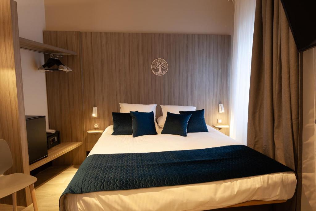 Postel nebo postele na pokoji v ubytování Hôtel Nancy Gare-Congrés