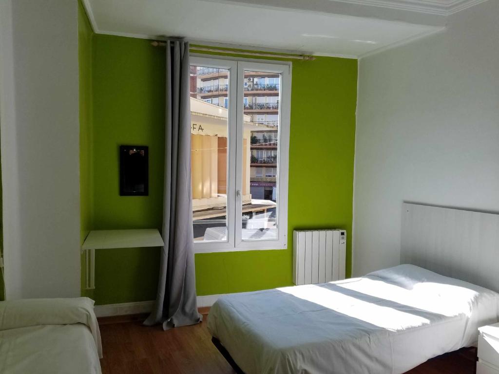 Cama o camas de una habitación en Ruzafa Youth Hostel