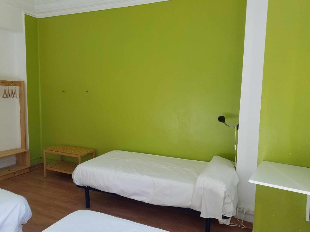 A bed or beds in a room at Russafa Youth Hostel