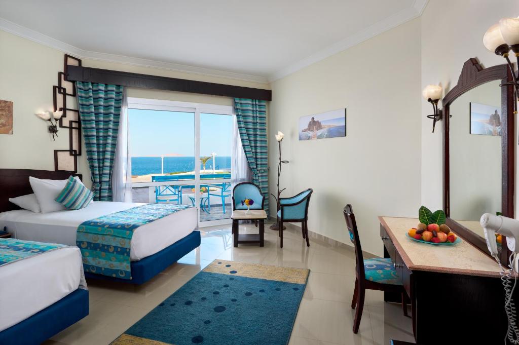 Postel nebo postele na pokoji v ubytování Dreams Beach Resort - Sharm El Sheikh