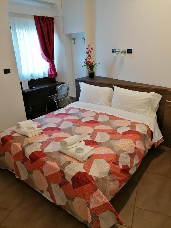 Postel nebo postele na pokoji v ubytování Accomodation Verona - City Centre