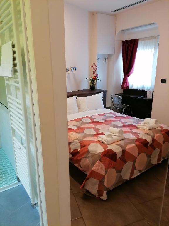 Postel nebo postele na pokoji v ubytování Accomodation Verona - City Centre