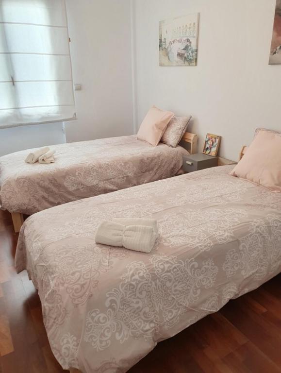 Postel nebo postele na pokoji v ubytování La Siesta en Tejares