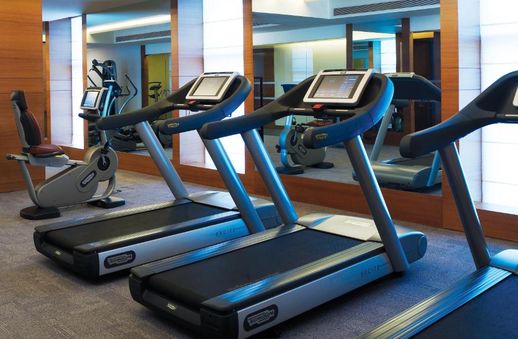 a row of treadmills in a gym at Vivanta Goa, Panaji in Panaji