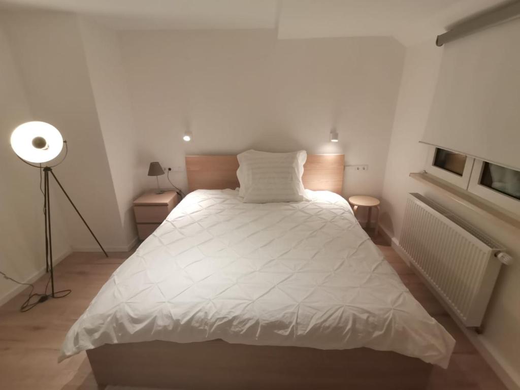 Ένα ή περισσότερα κρεβάτια σε δωμάτιο στο Precioso apartamento, fantásticas vistas