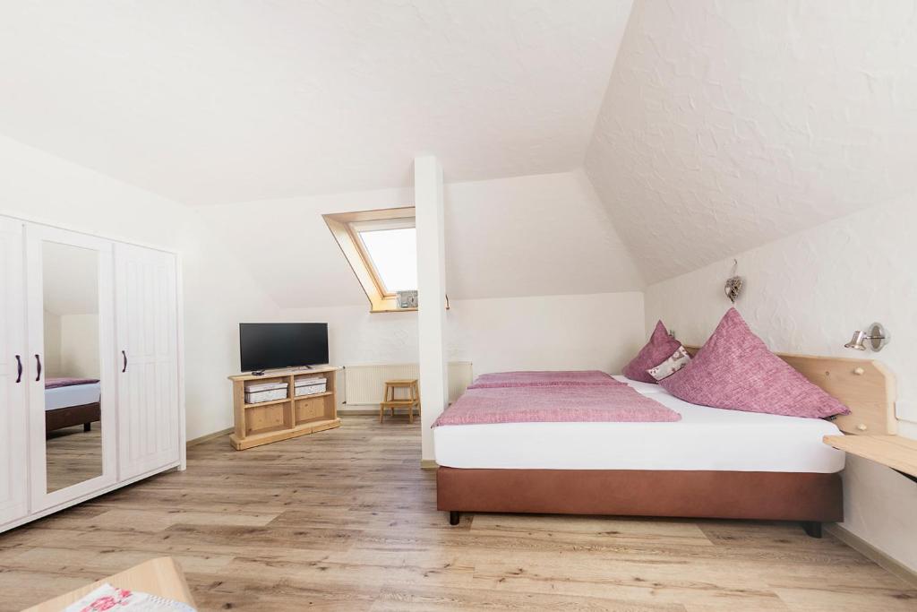 Postel nebo postele na pokoji v ubytování Landpension Pferdekoppel - B&B - Self Checkin