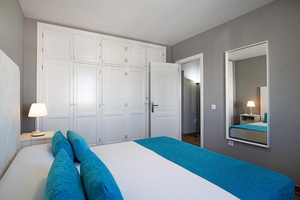 Postel nebo postele na pokoji v ubytování Apartamentos La Estrella iii