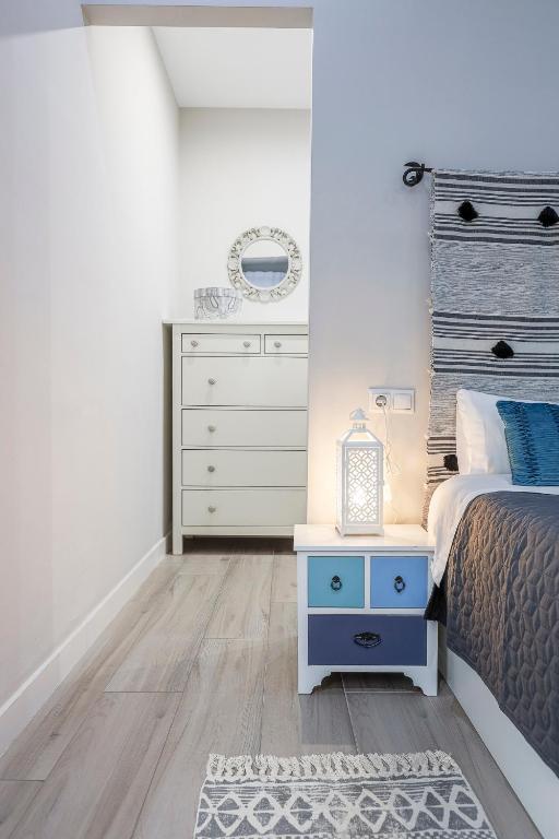 Łóżko lub łóżka w pokoju w obiekcie Minimalismo de Vanguardia con altas calidades 1 BR