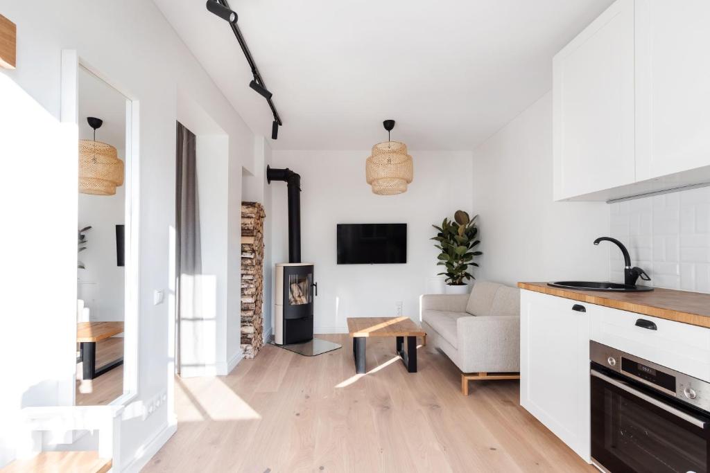 Zveryno Namelis 2 kambarių butas Žvėryne su židiniu, terasa ir privačiu kiemeliu - отзывы и видео