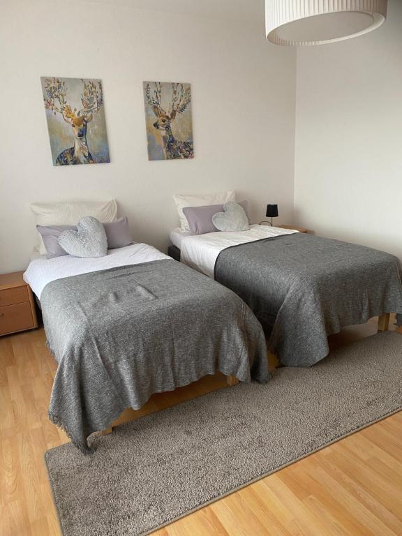 Tempat tidur dalam kamar di Ferienhaus Löhr mit Treppenlift