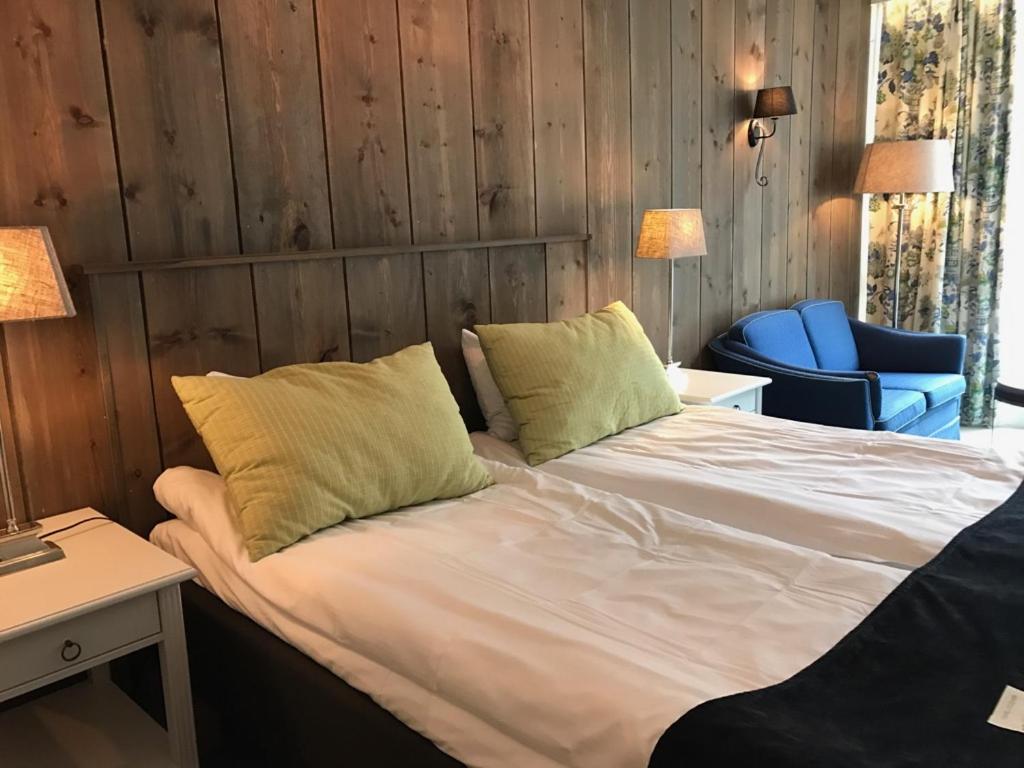 Postel nebo postele na pokoji v ubytování Hotel Union Geiranger Bad & Spa