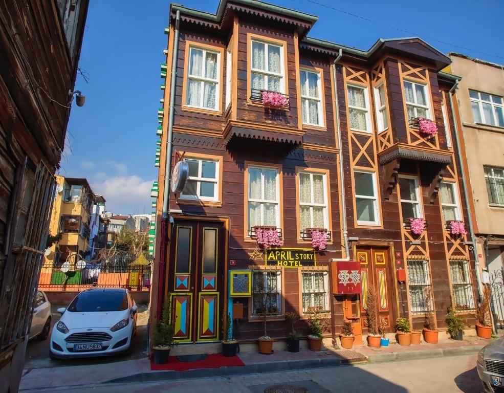 a building with a car parked in front of it at April Hotel in Istanbul