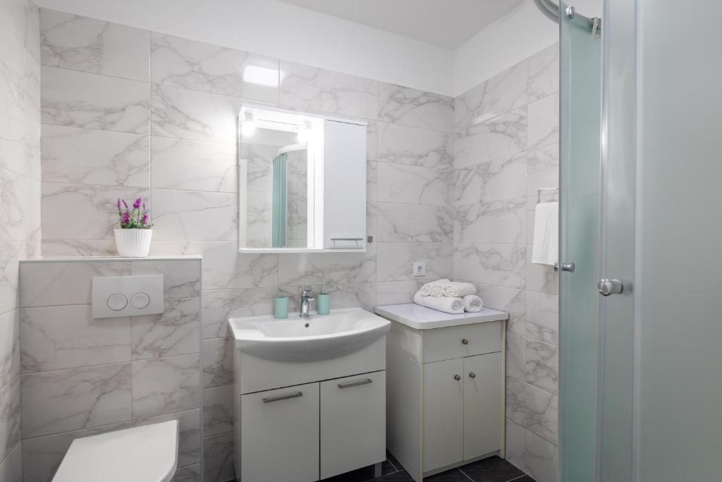 Kúpeľňa v ubytovaní Seaside Apartment Tafra