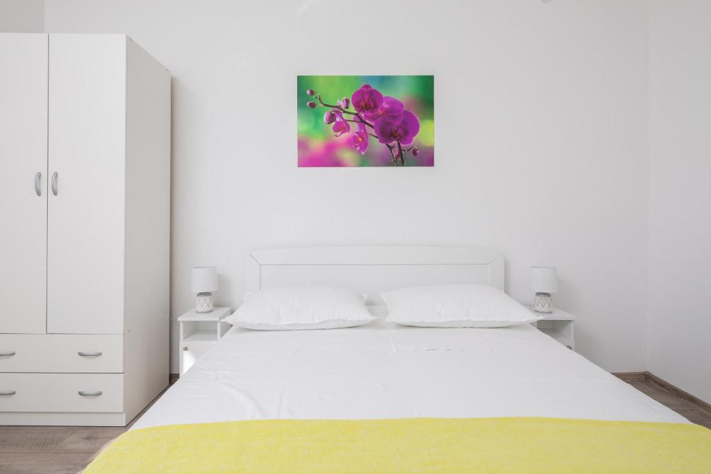 Posteľ alebo postele v izbe v ubytovaní Seaside Apartment Tafra