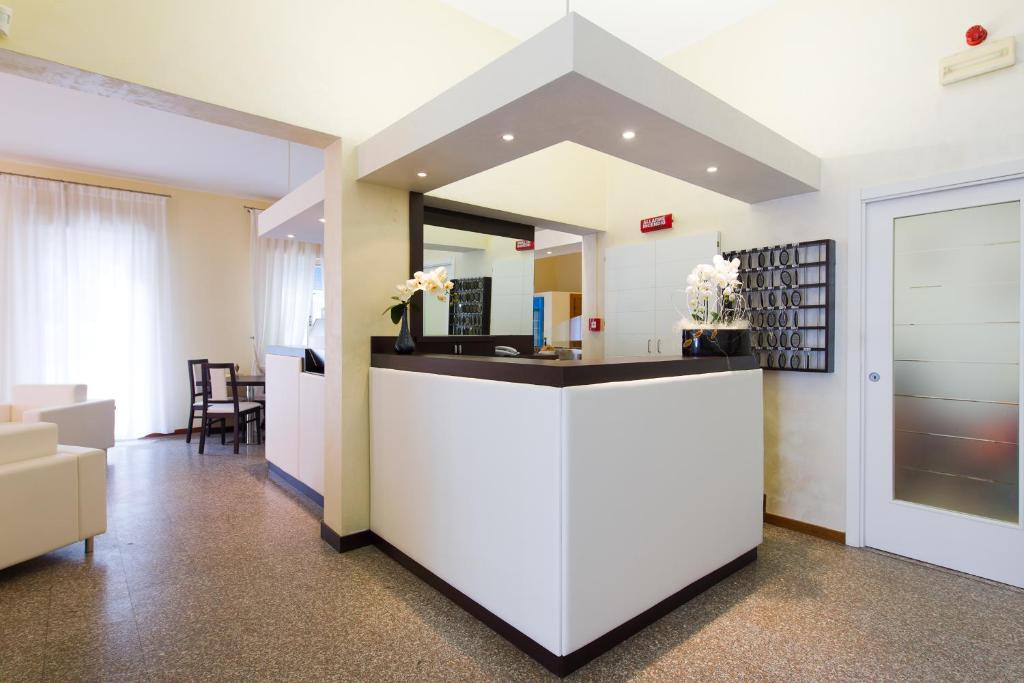 Kuchyň nebo kuchyňský kout v ubytování Hotel Galassia