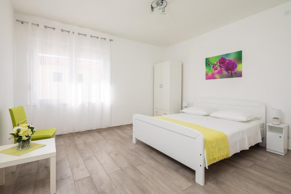 Posteľ alebo postele v izbe v ubytovaní Seaside Apartment Tafra