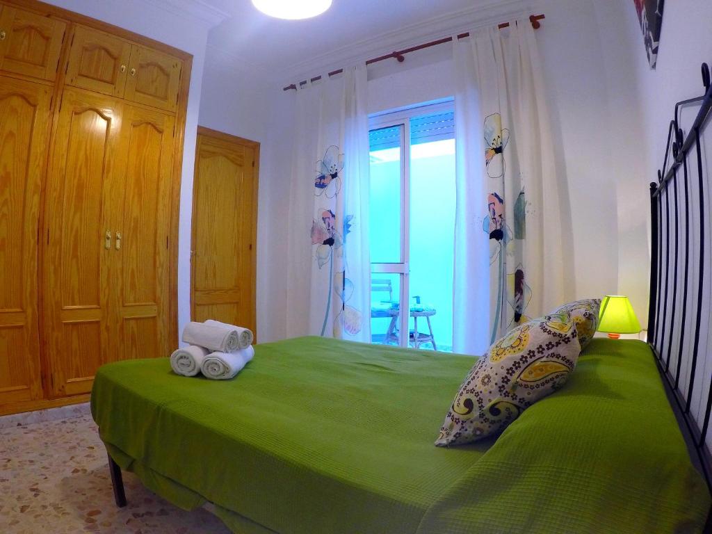 Posteľ alebo postele v izbe v ubytovaní ConilPlus apartments AZORIN II