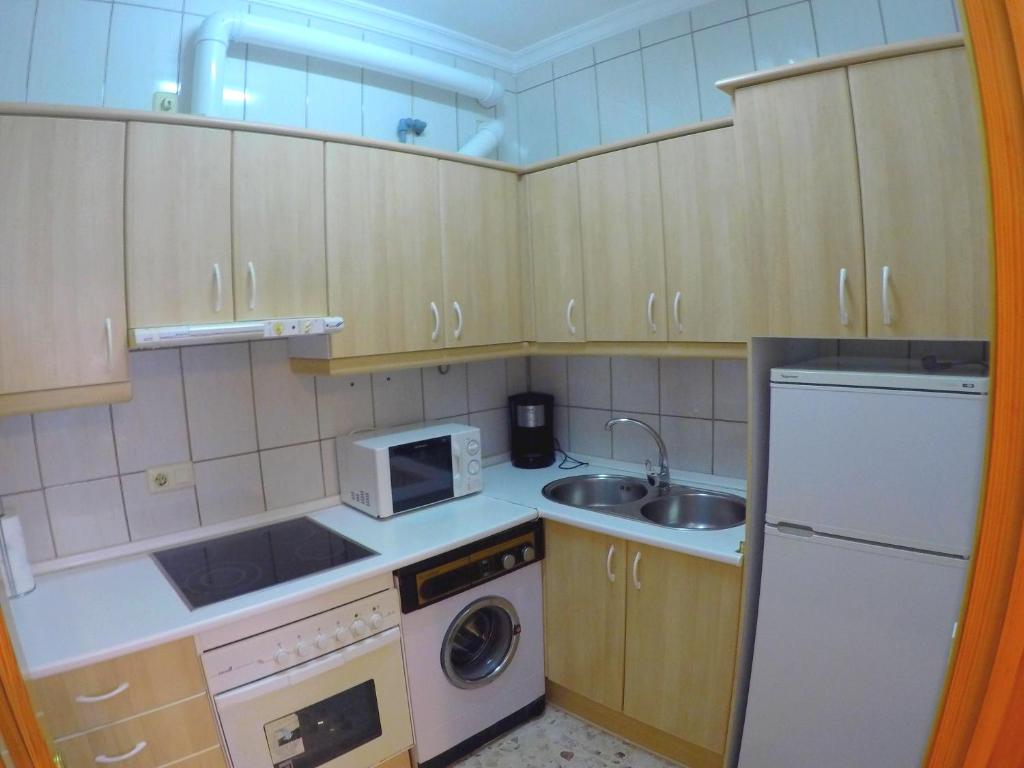 Kuchyňa alebo kuchynka v ubytovaní ConilPlus apartments AZORIN II