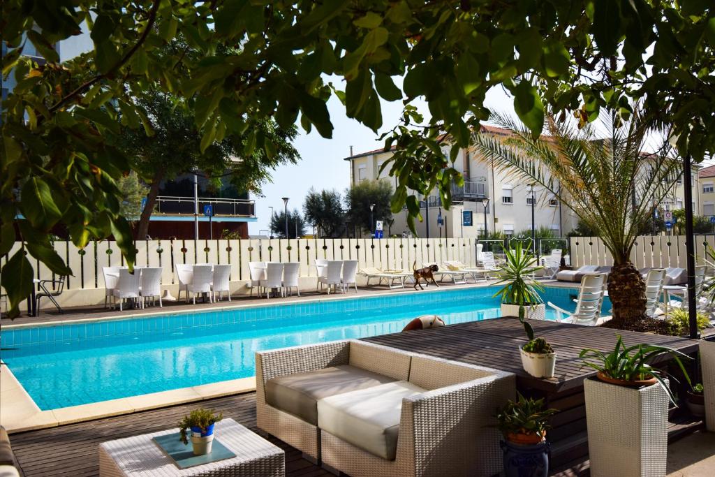 Bazén v ubytování Hotel Alba nebo v jeho okolí