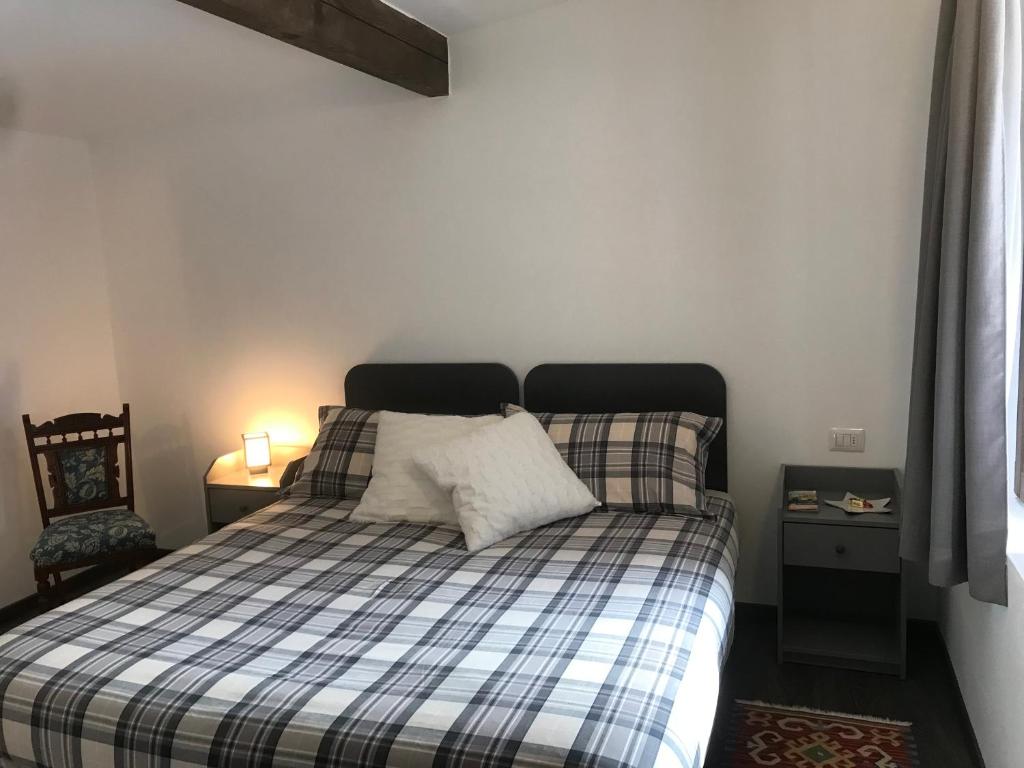A bed or beds in a room at Agriturismo Cascina Cornella