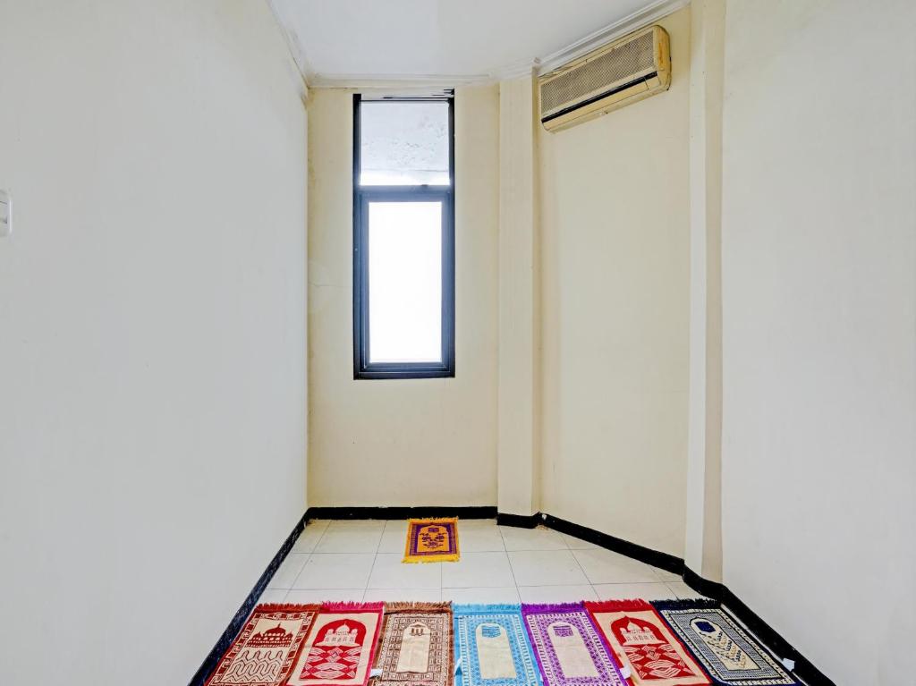 Fotografie z fotogalerie ubytování Graha Ara Homestay Syariah RSUD Dr Soetomo Surabaya Mitra RedDoorz v destinaci Surabaja