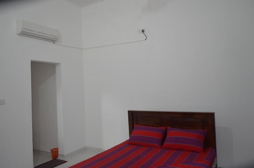 Postel nebo postele na pokoji v ubytování Ruins Villa