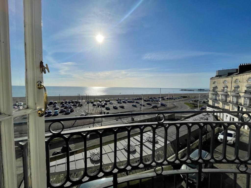 a balcony with a view of a parking lot at Stunning 2 bed with Sea View in Hastings Old Town in Hastings