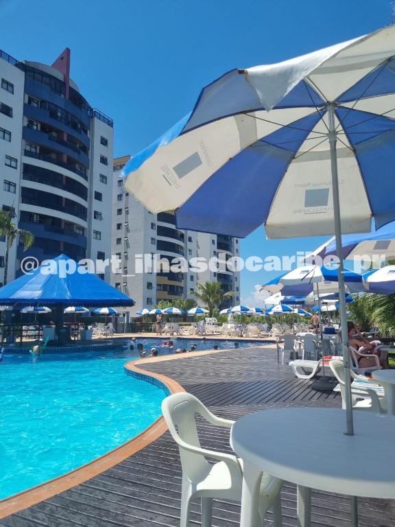 Bazén v ubytování Apto Cond Ilhas do Caribe - Pr - Beira Mar nebo v jeho okolí