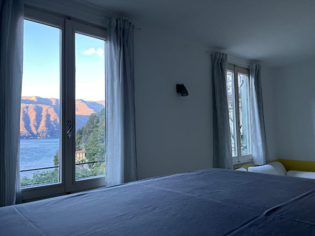 A bed or beds in a room at GLI ORTI DELLA CIVERA " Cottagecore" Amazing View