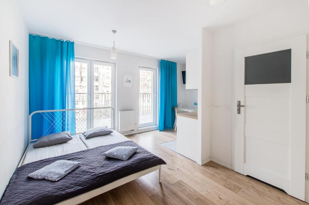 Posteľ alebo postele v izbe v ubytovaní Smart Rental Management Apartments - CITY CENTER
