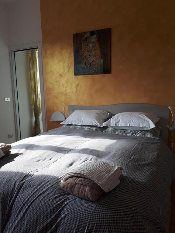 Posteľ alebo postele v izbe v ubytovaní B&B Tre Confini