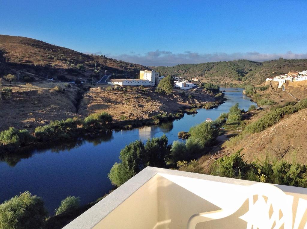 a view of a river from a building at Paraíso D`el Rio in Mértola