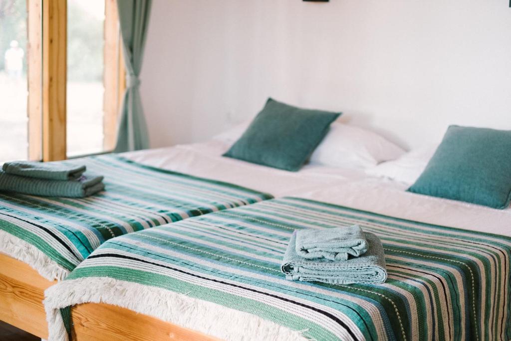 Cama o camas de una habitación en miCielo - Baumhäuser