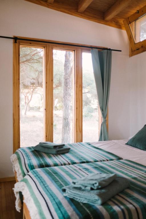 Cama o camas de una habitación en miCielo - Baumhäuser