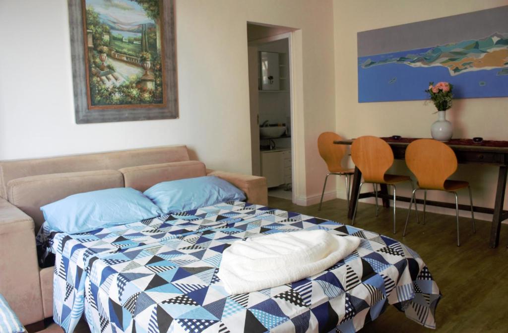 A bed or beds in a room at COPACABANA Praia