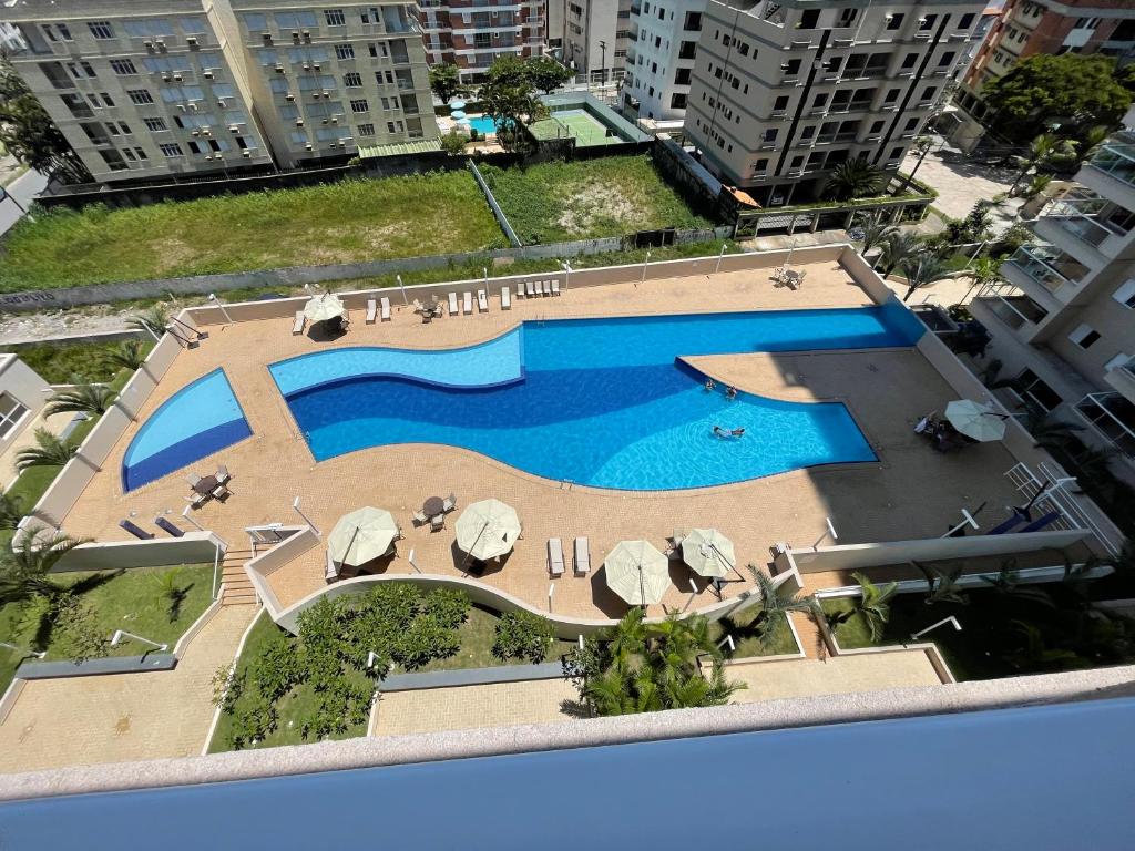 Lazer de resort a poucos passos da praia - Apartamento De Dos Dormitorios