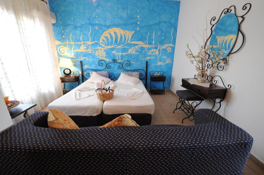 Postel nebo postele na pokoji v ubytování Thalassa Hotel