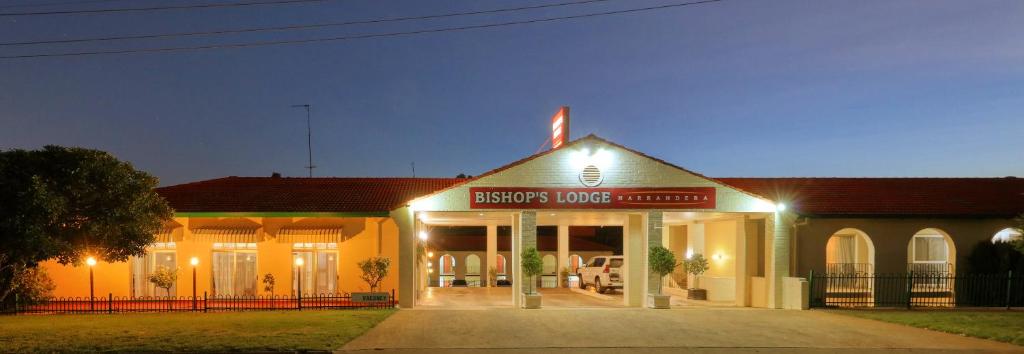 a building with a sign that reads essex house function at Bishops Lodge Narrandera in Narrandera