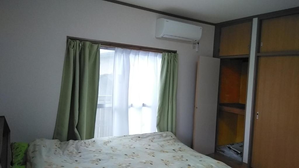 Letto o letti in una camera di コウノトリの里の宿